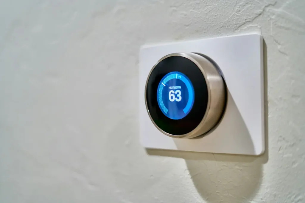 Home thermostat displaying an energy-saving temperature setting
